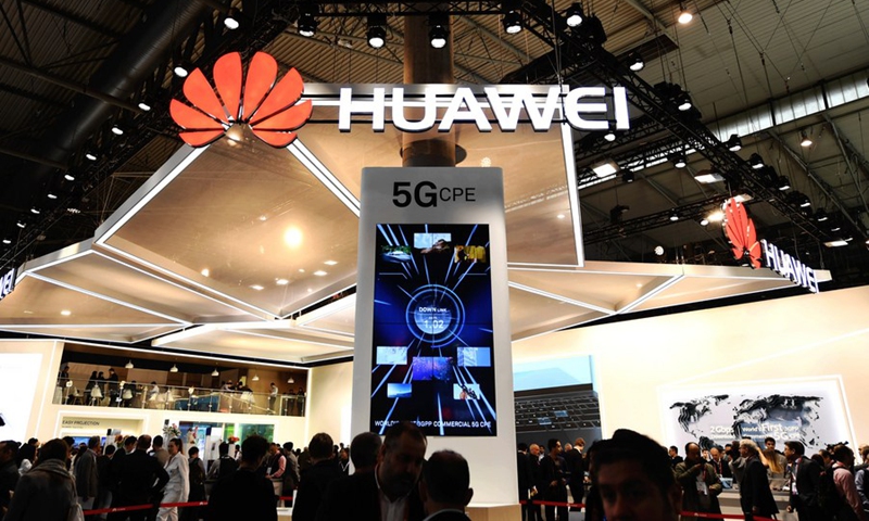 Photo taken on Feb. 26, 2018 shows a screen displaying the 5G technology at the booth of China's telecom giant Huawei during the 2018 Mobile World Congress (MWC) in Barcelona, Spain.(Photo: Xinhua)
