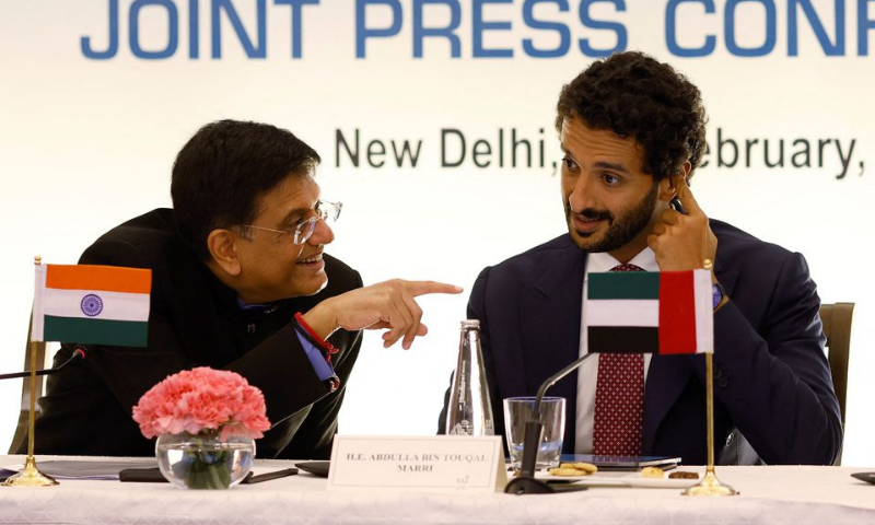 India's Minister of Commerce and Industry, Piyush Goyal talks to Abdulla Bin Touq Al Marri, Minister of Economy of the United Arab Emirates, (UAE), during their joint news conference in New Delhi, India on Friday. — Reuters