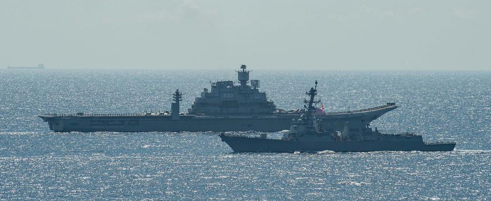 India’s aircraft carrier INS Vikramaditya and a US guided-missile destroyer carrying out joint-maneuvers in the Malabar 2020 exercise held in the Indian Ocean.