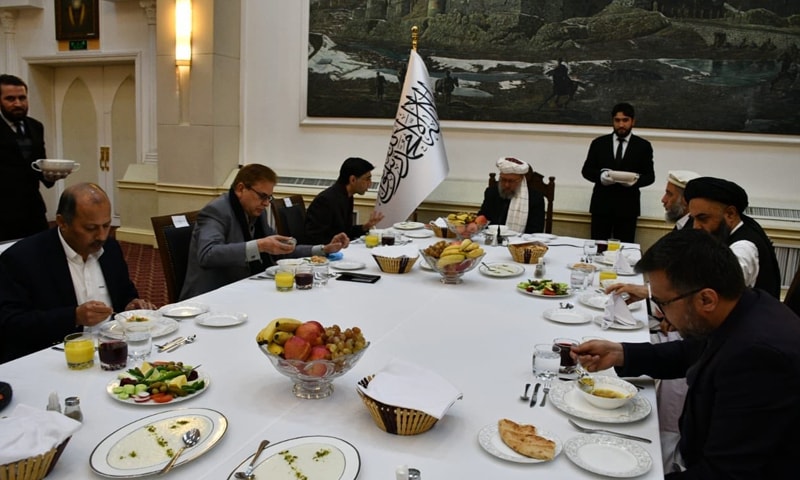 Afghanistan acting Deputy Prime Minister Abdul Salam Hanafi hosts a lunch for the Pakistani delegation led by National Security Adviser (NSA) Moeed Yusuf in Kabul. — Photo courtesy Pakistan Ambassador to Afghanistan Mansoor Ahmad Khan Twitter