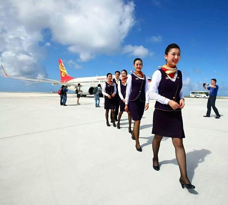 Stewardesses-get-off-aircraft-Fiery-Cross.jpg