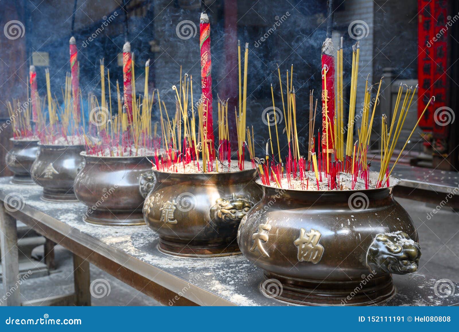 burning-incense-sticks-asian-buddhist-temple-joss-pots-traditional-ritual-religions-typical-rite-offering-temples-152111191.jpg
