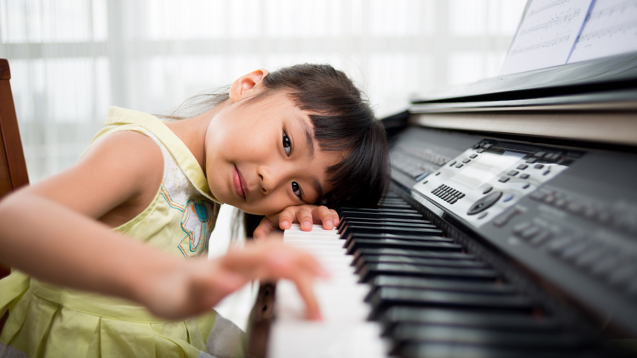 child_playing_piano_cropped.jpg