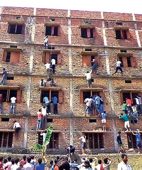 134796_Bihar-exam-building-close-up_GettyImages-467607852_credit-STRDEL_AFP_Getty-Images.jpg