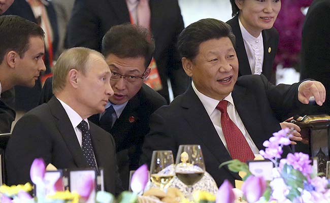 xi-putin650_650x400_61441248219.jpg