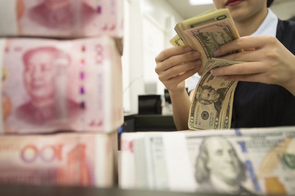 counting_yuan_and_dollars-1.jpg