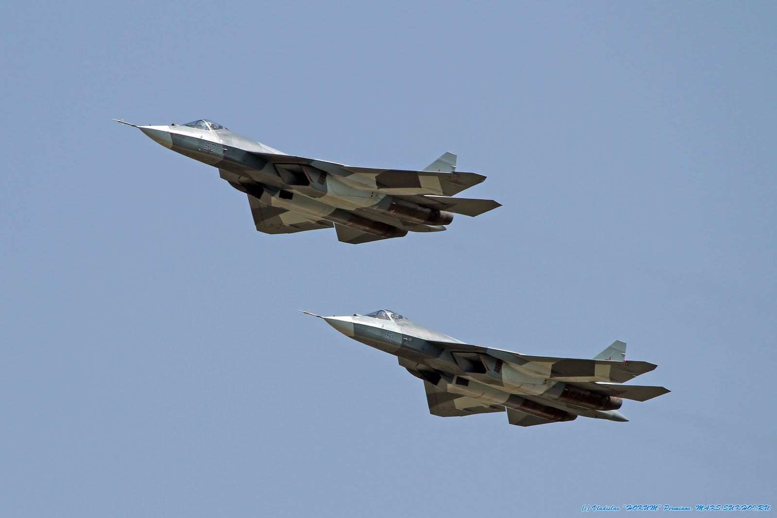Two+Russian+PAK-FA+Stealth+Fighters+Flying+Together.jpg