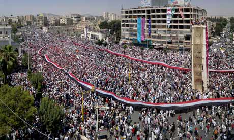 Syrian-protesters-carry-a-007.jpg