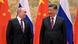 Vladimir Putin and Chinese President Xi Jinping, their flags behind them