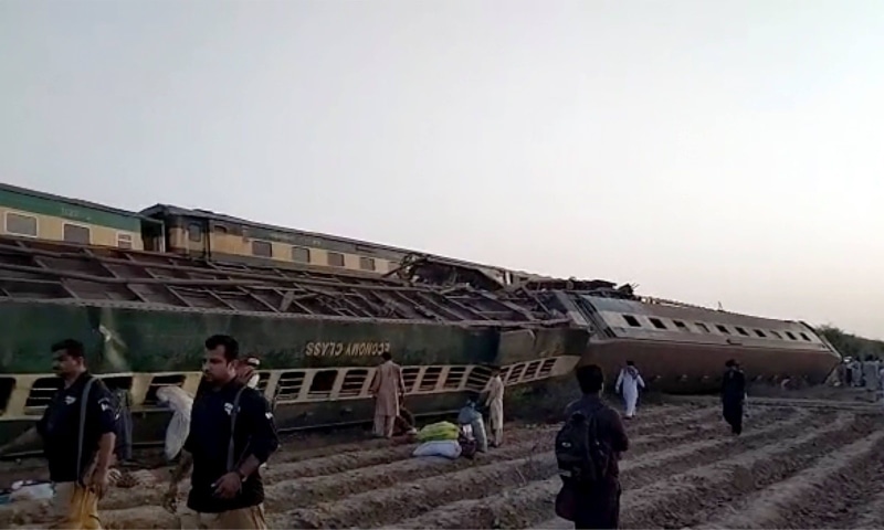 This image from a video shows the site of a train collision in Ghotki. — AP