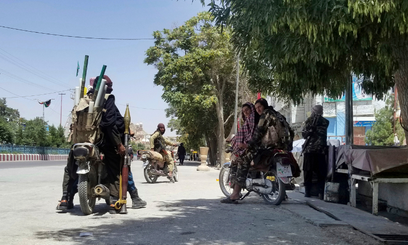 Taliban fighters patrol inside the city of Ghazni, southwest of Kabul, Afghanistan on Thursday. — AP