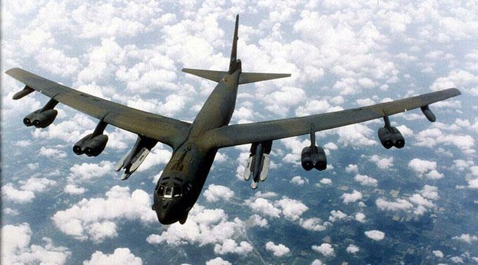 254411-B-52_flying_over_clouds.jpg