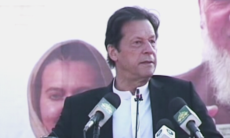Prime Minister Imran Khan speaks at a ceremony after inaugurating the Sehat Sahulat Cards programme in Swat on Friday. — DawnNewsTV