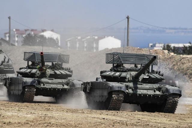 Russian T-72B3M tank in Crimea with top slatted cage armor.