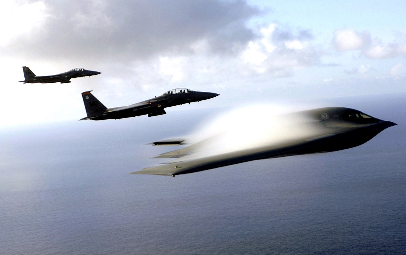 gpw-20050822-fullsize-UnitedStatesAirForce-060707-F-3961R-003-Pacific-Ocean-B-2-Spirit-stealth-bomber-F-15E-Strike-Eagle-July-2005-Guam.jpg