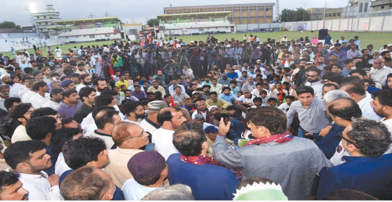CM Murad Ali Shah speaks at the inauguration ceremony of the Baloch Mujahid Football Stadium and Community Center in Ibrahim Hyderi on Friday.—Dawn