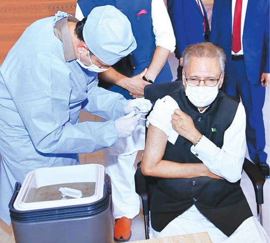 President Dr Arif Alvi receives a booster dose of vaccine at F-9 vaccination centre on Wednesday.—PPI