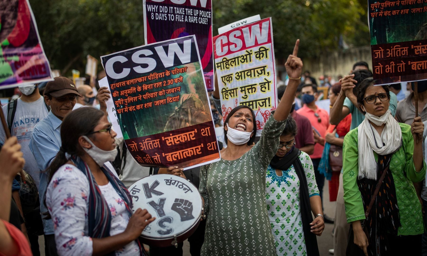 An activist shouts slogans during a protest against the gang rape of a woman in in New Delhi, India, Friday. — AP