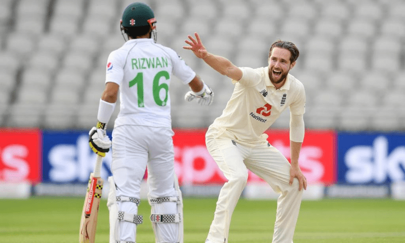<p>This file photo shows Mohammad Rizwan (L) and England’s Chris Woakes (R) during a Test match between Pakistan and England in Nov 2020. — Reuters/File</p>