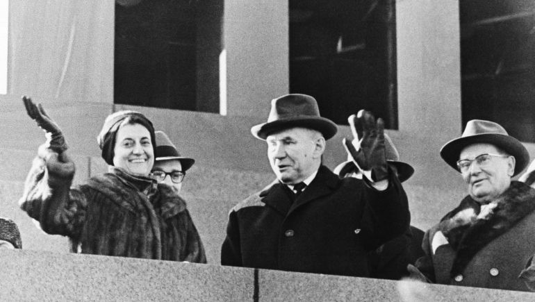 Mrs. Indira Gandhi, the Indian Prime Minister, and Yugoslav President Josip Broz Tito flank Soviet Premier Alexei Kosygin on stand atop Lenins Mausoleum as they watch huge parade in Moscows Red Square on Nov. 7, 1967. Occasion was the 50th anniversary of the Bolshevik Revolution. (AP Photo)