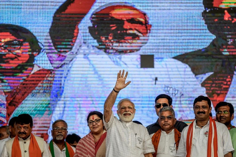Indian Prime Minister Narendra Modi waves at a public rally in Kolkata, India, on April 3. (Atul Loke/Getty Images)