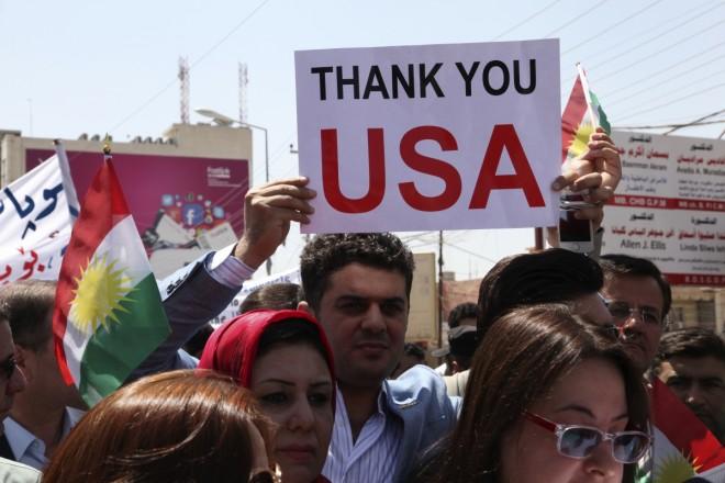 kurdish-resident-holds-signs-during-demonstration-support-peshmerga-troops-front-u-s.jpg