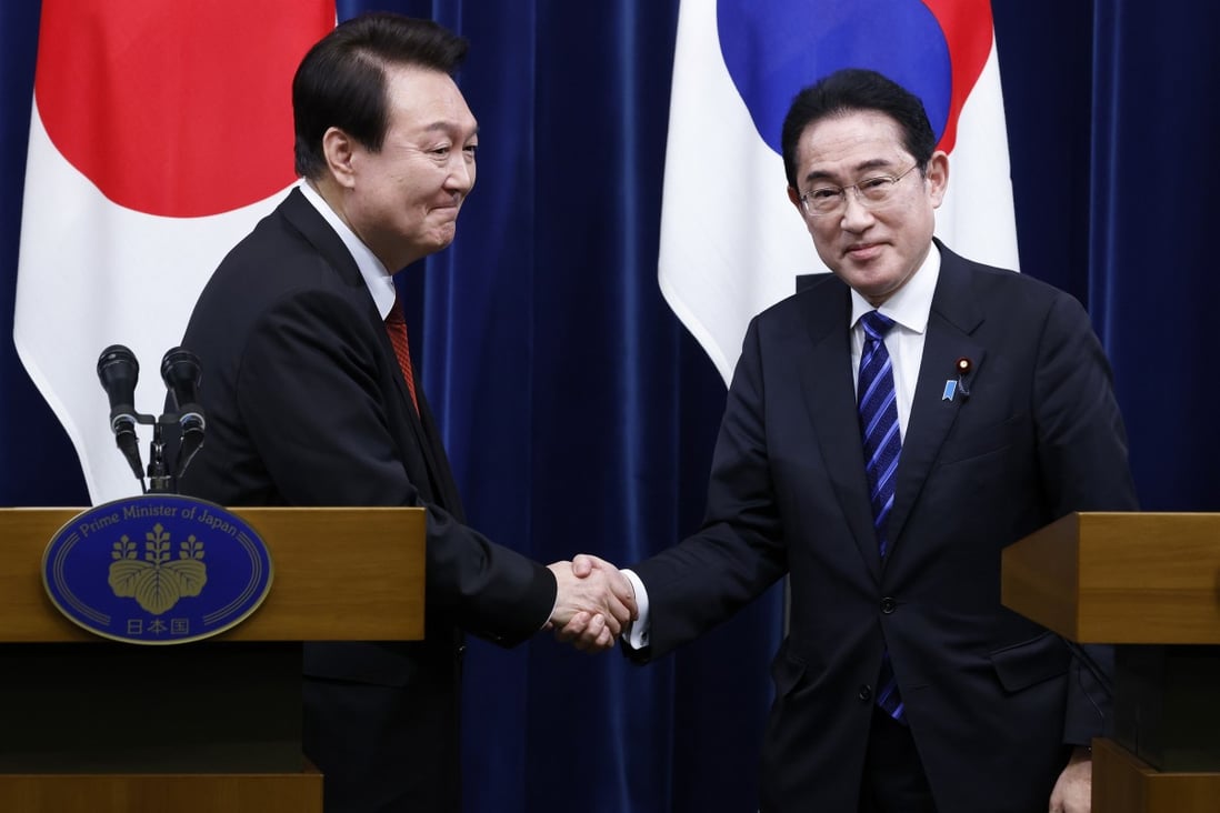 South Korean President Yoon Suk-yeol (left) and Japanese Prime Minister Fumio Kishida meet in Tokyo in March. Photo: Pool via AP
