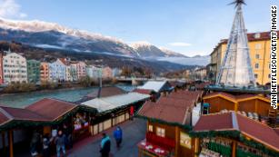 People gather at the annual Christmas market during the first day of a nationwide lockdown for the uninoculated on November 15.