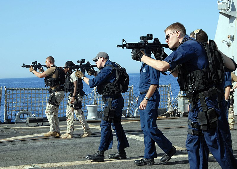 800px-US_Navy_080619-N-2838W-025_Members_of_the_visit%2C_board%2C_search_and_seizure_%28VBSS%29_team_aboard_the_guided-missile_destroyer_USS_Bulkeley_%28DDG_84%29_practice_essential_gun-firing_procedures_with_the_MK-18_rifle.jpg