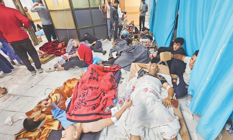  Palestinians wounded in Israeli strikes lie on the floor at the Indonesian Hospital after the Al Shifa facility went out of service amid the Israeli ground invasion of Gaza Strip.—Reuters 
