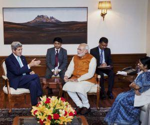 07modi-with-kerry-pti.jpg