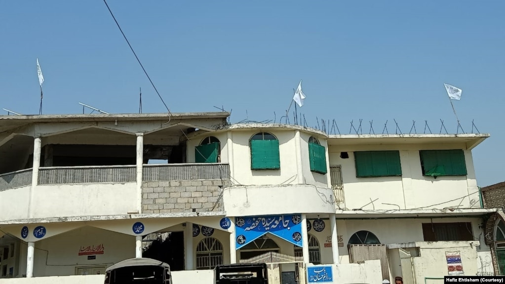 Taliban flags are flying on the roof of The University of Hafsa. 