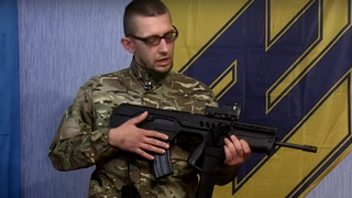 An Azov militiaman with a Tavor rifle