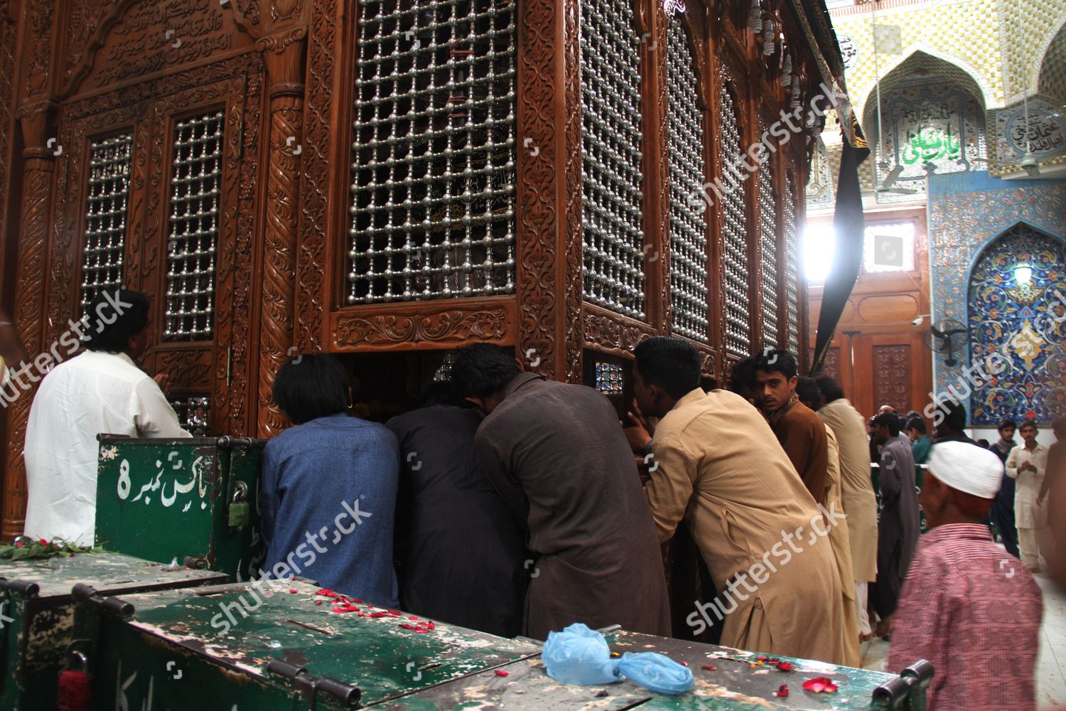 suicide-bombing-at-the-shrine-of-lal-shahbaz-qalandar-kills-at-least-80-people-sehwan-pakistan-shutterstock-editorial-8410939g.jpg