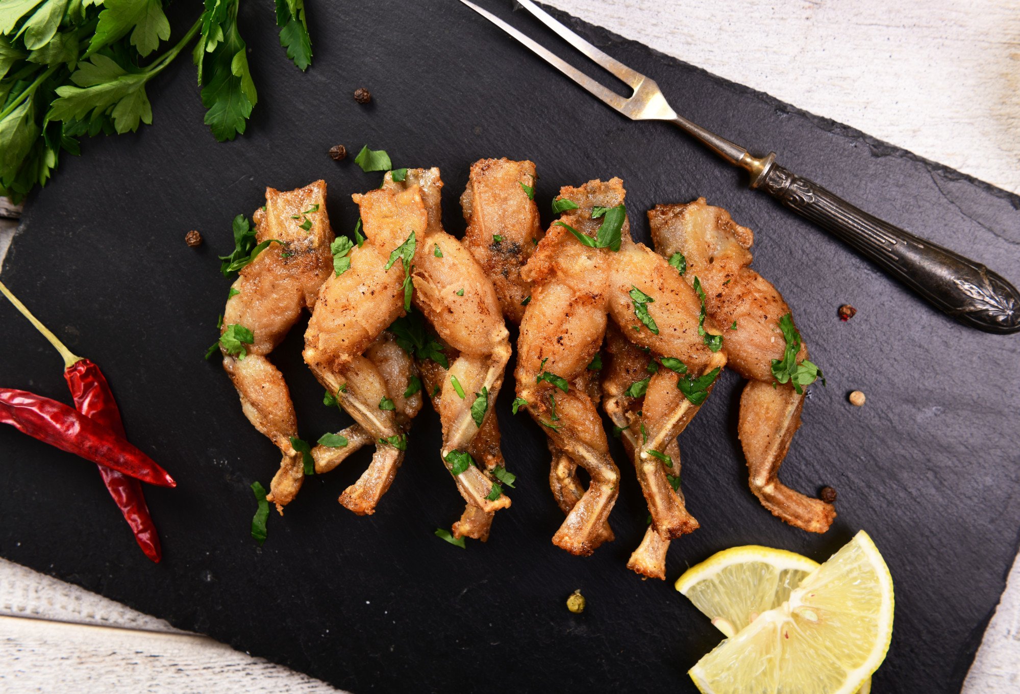 Western-style baked frogs’ legs. In France, edible frog species have been protected for decades. Photo: Shutterstock