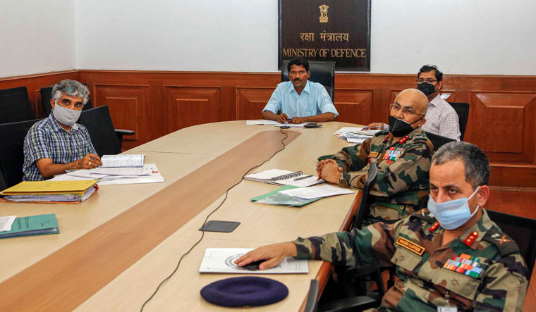 Talk time: Additional Secretary (department of defence production) V.L. Kantha Rao along with officials from the DDP, defence ministry and other senior civil and military officials during a videoconference with employees of the ordnance factory board in New Delhi | PTI