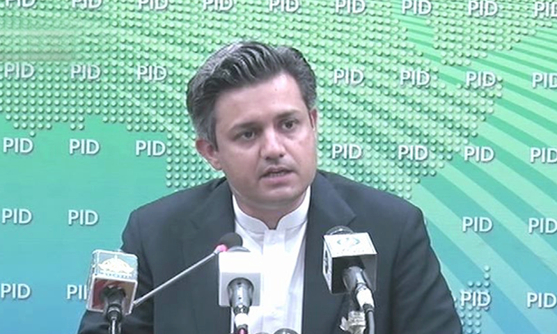 Finance Minister Hammad Azhar addressing a press conference after chairing a meeting of the Economic Coordination Committee on Wednesday . — DawnNewsTV