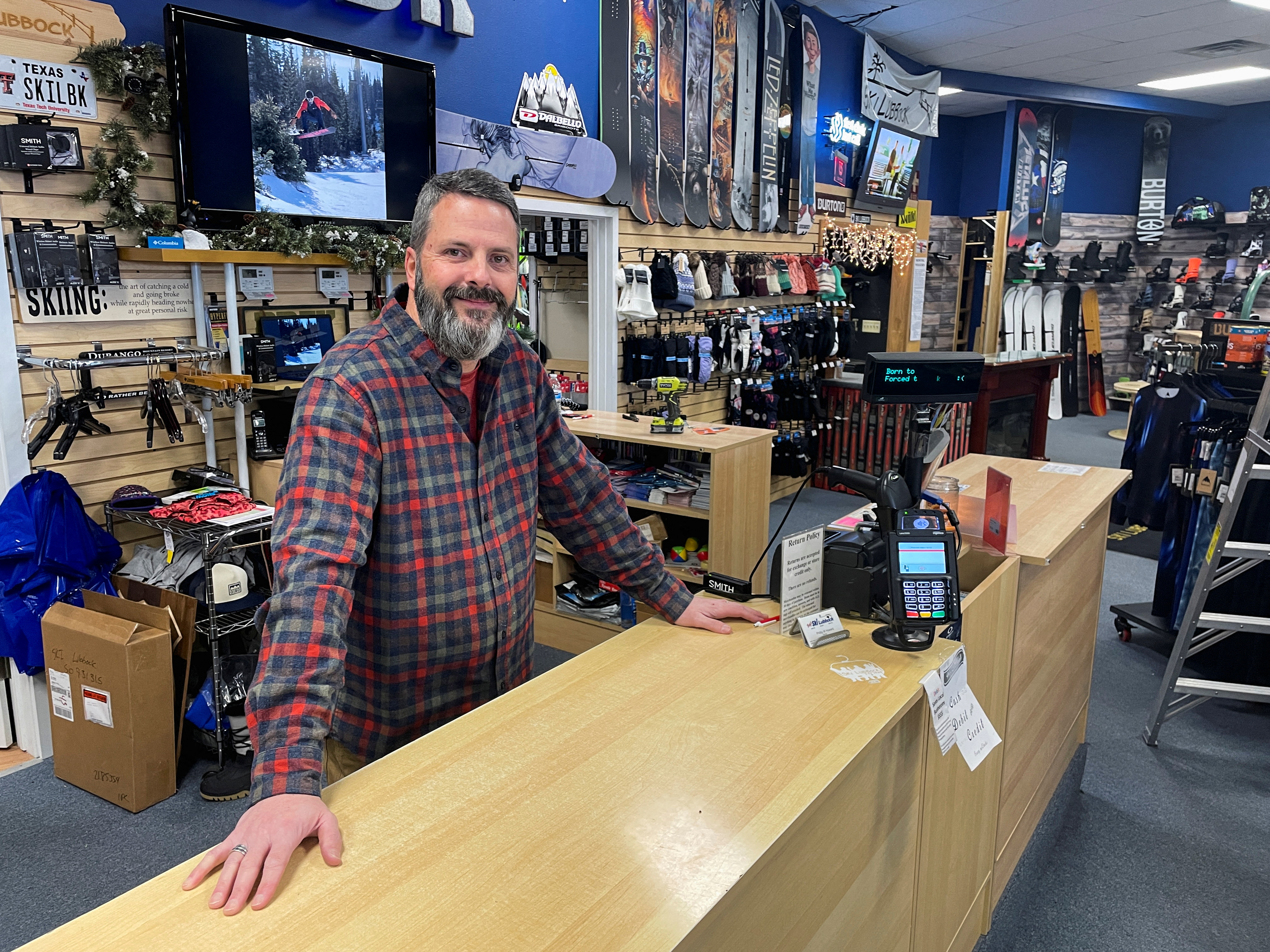 Phillip Howard poses for a photo inside his Troy's Ski Lubbock shop, in Lubbock, Texas, January 14, 2022. Picture taken January 14, 2022. Howard says supply chain woes are making life extremely difficult for small business owners like himself. REUTERS/Brad Brooks