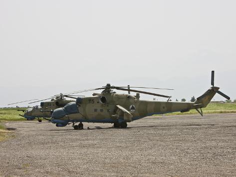 stocktrek-images-an-mi-35-attack-helicopter-at-kunduz-airfield-afghanistan.jpg