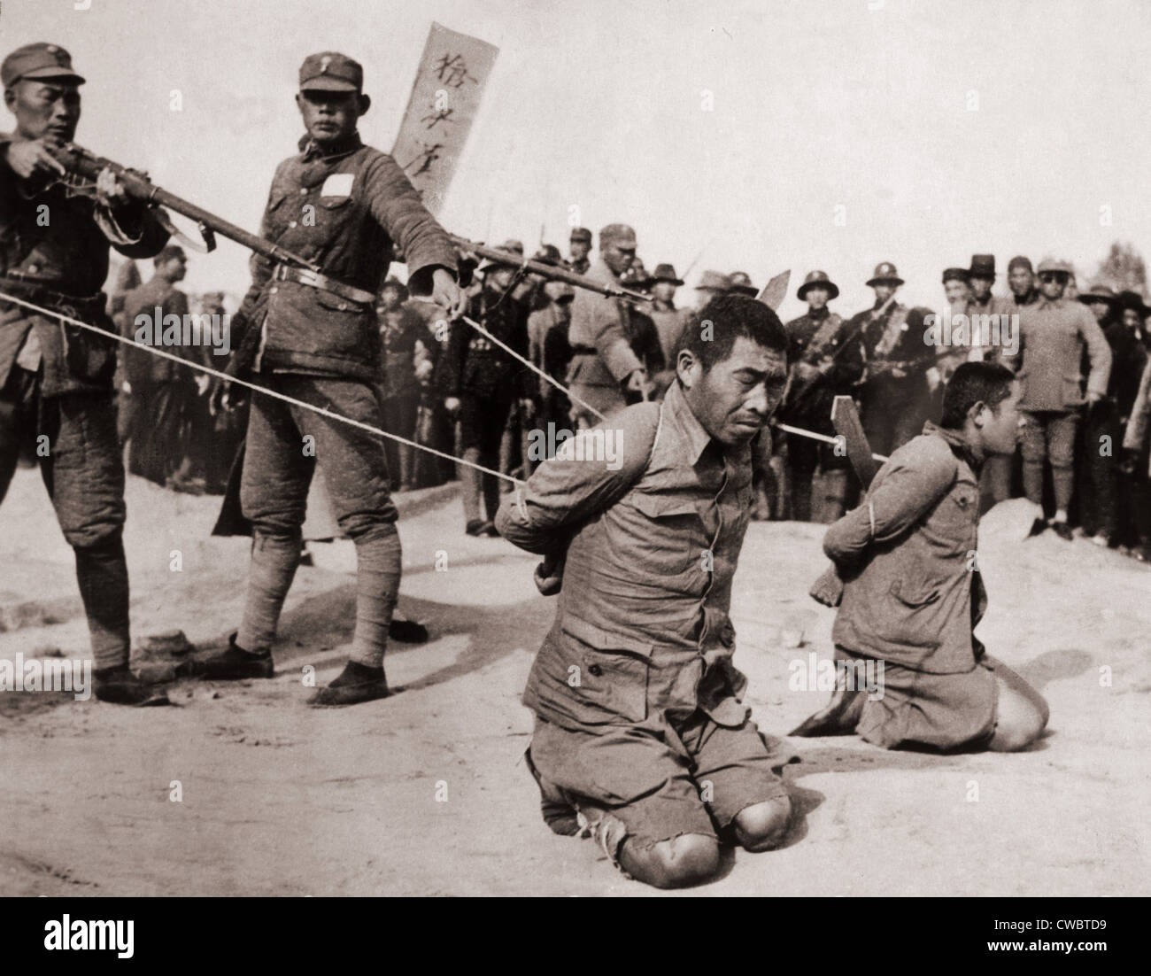 two-chinese-men-kneeling-prior-to-execution-by-chinese-soldiers-the-CWBTD9.jpg