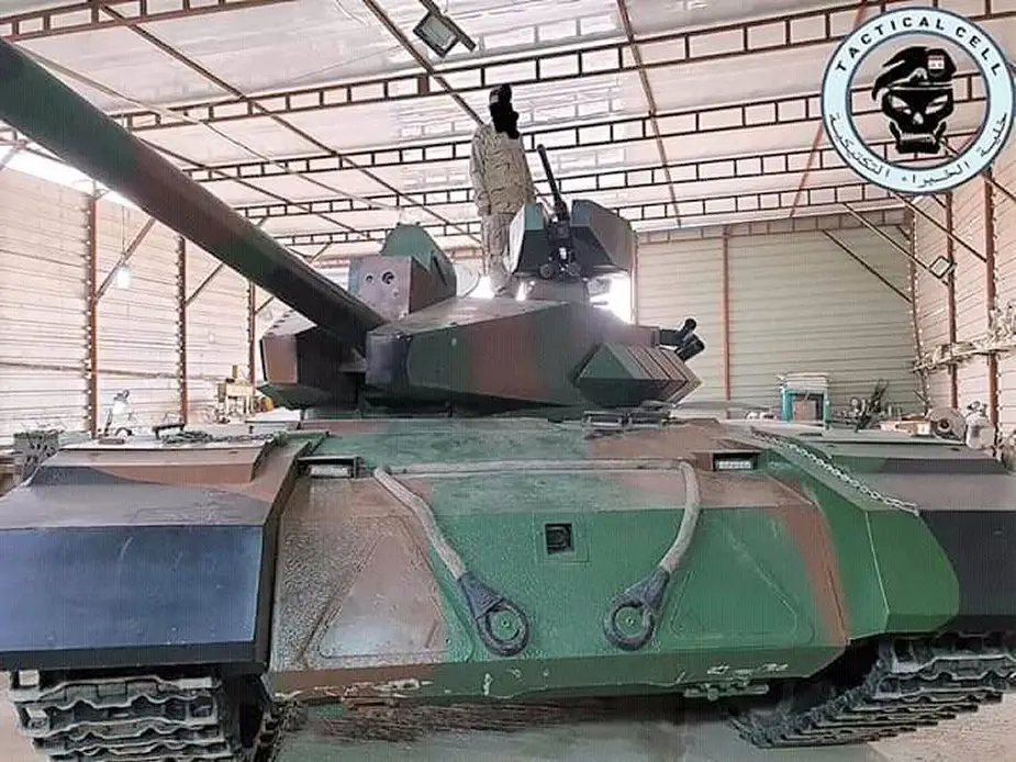 Iraq_unveils_indigenous_T-55_Al-Kafil-1_MBT_main_battle_tank_2.jpg