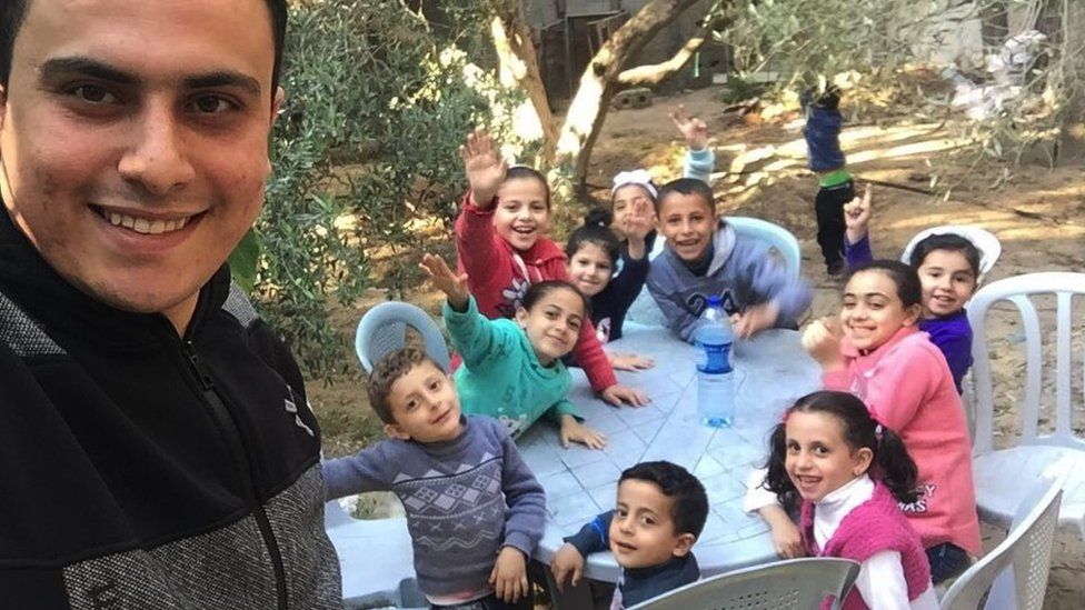 A selfie of the al-Naouq children and their uncle Ahmed