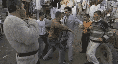 Borat-Dancing-With-Some-Hip-Gypsies-In-a-Roma-Village-In-Romania.gif