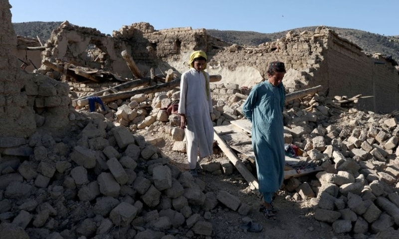 Afghan people walk through the debris of damaged houses after the recent earthquake in Wor Kali village in the Barmal district of Paktika province, Afghanistan, June 25. — Reuters