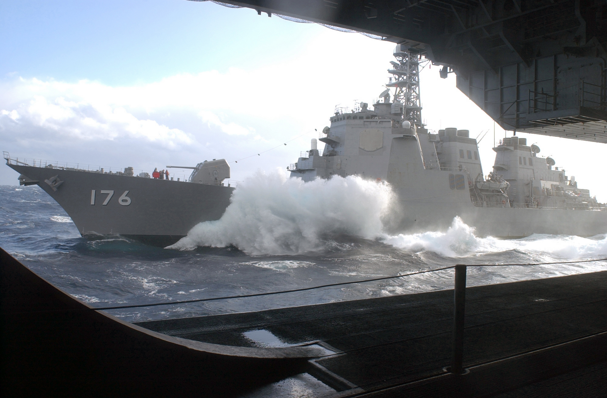 US_Navy_021210-N-5781F-003_Japan_Maritime_Self_Defense_Force_%28JMSDF%29_ship,_JDS_Chokai_%28DDF_176%29,_steams_along_side_Kitty_Hawk_for_a_replenishment_at_sea_%28RAS%29.jpg