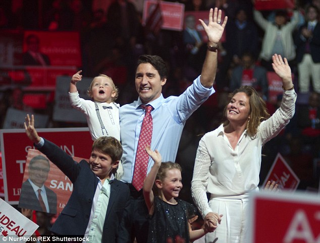 2D98B73700000578-3280490-Justin_with_his_wife_and_their_three_children_at_an_election_ral-m-16_1445353869749.jpg