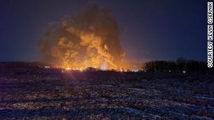 Flames erupt after a train derailment in East Palestine, Ohio, on Friday.