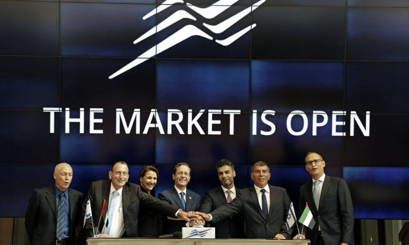 Israeli President Isaac Herzog (C), UAE Ambassador to Israel Mohammad Al-Khaja (C-R), UAE Minister of State for Food and Water Security Mariam Al-Muhairi and former minister Gabi Ashkenazi, open the Israeli stock market in Tel Aviv in this July 14 file photo. — AFP