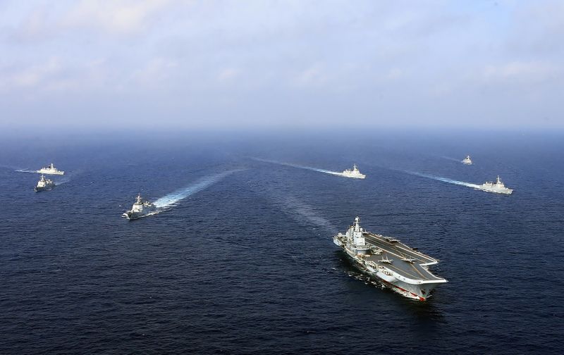 The Chinese aircraft carrier Liaoning and other ships sail during a naval drill in the East China Sea in April 2018.
