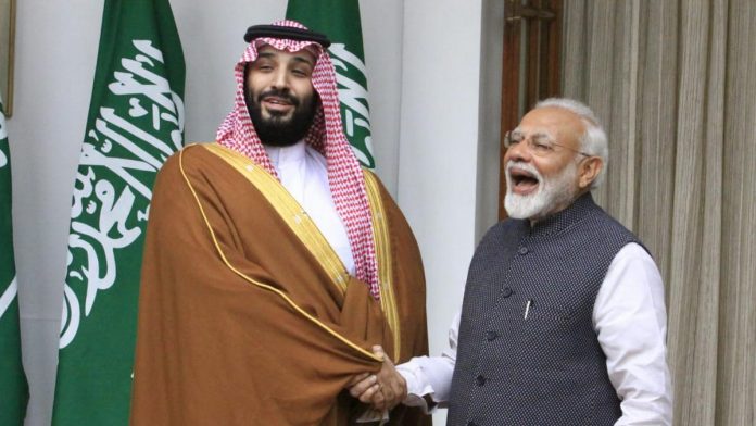 Saudis-Mohammed-bin-Salman-with-PM-Modi-696x392.jpg